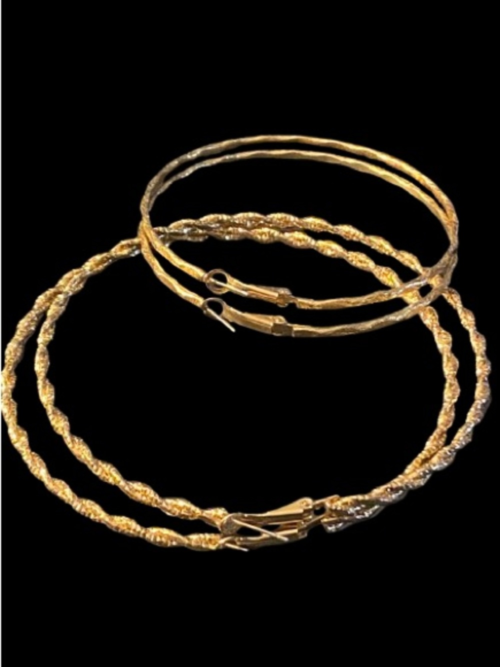 Two pairs of Large Gold Twisted Hoop Pierced Earrings 3.5” & 2.75” In Diameter